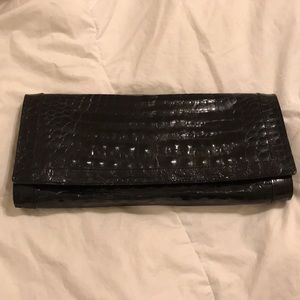 Fine crocodile clutchbag in black.